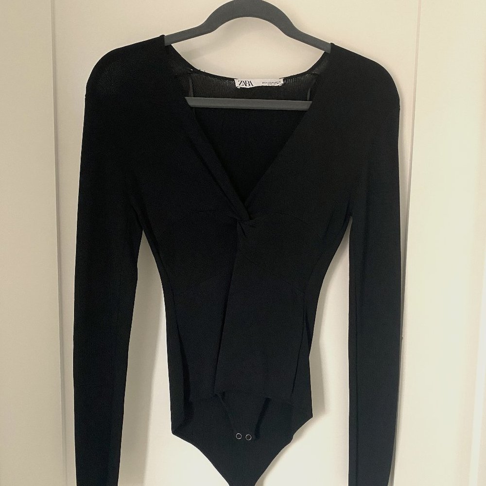 Sophisticated and sexy black body suit